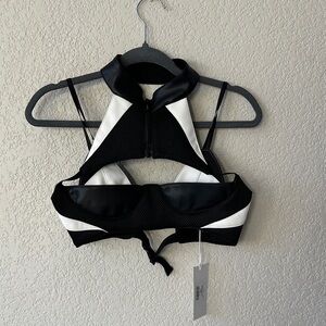 UNDERWORLD BRA TOP 
Vegan leather 

NAMILIA